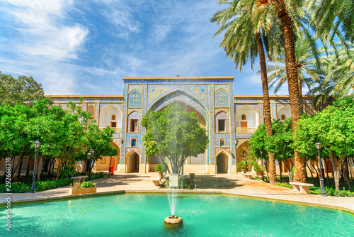 Fountain in the middle of traditional Persian courtyard