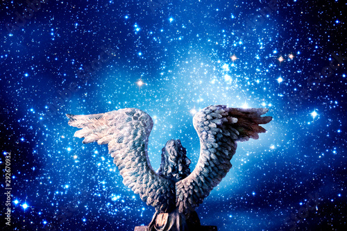 angel archangel with Universe filled with stars 