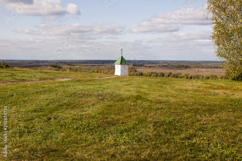 little white chapel on the Bank of the Oka river in Konstantinovo Russia photo