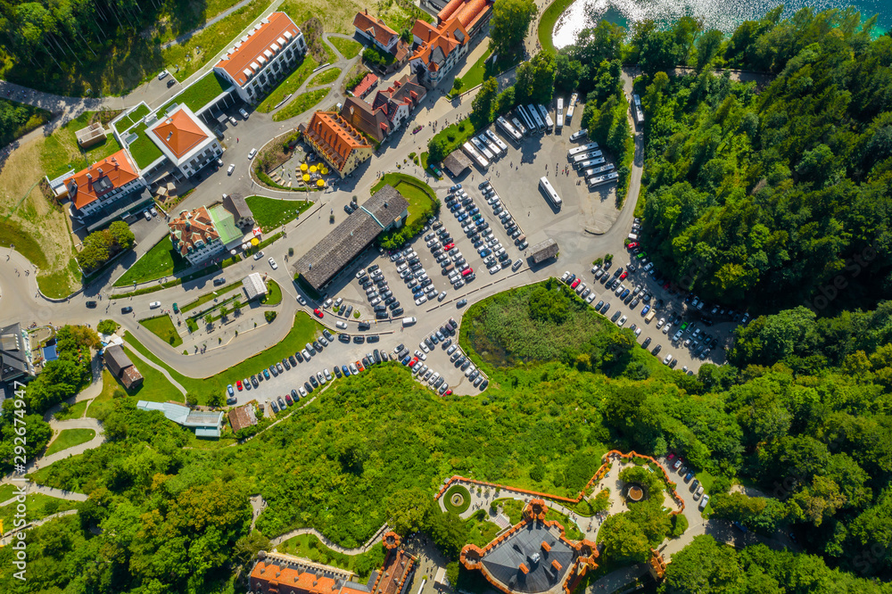 Aerial view on Hohenschwangau Castle Schwangau, Bavaria, Germany. Drone picture of landscape witn trees.