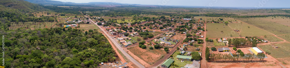 Panoramic aerial view of the small rural town Bom Jardim and surrounding, with mountains in the background, Mato Grosso, Brazil