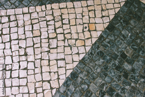 top view of light and dark paving stones close up