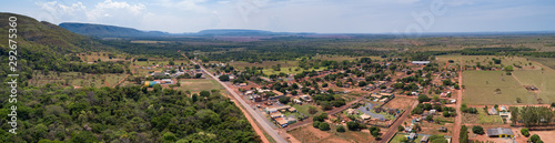 Panoramic aerial view of the small rural town Bom Jardim and surrounding, with mountains in the background, Mato Grosso, Brazil