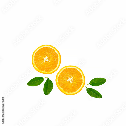 Orange fruit slices with leaves isolated on white background.