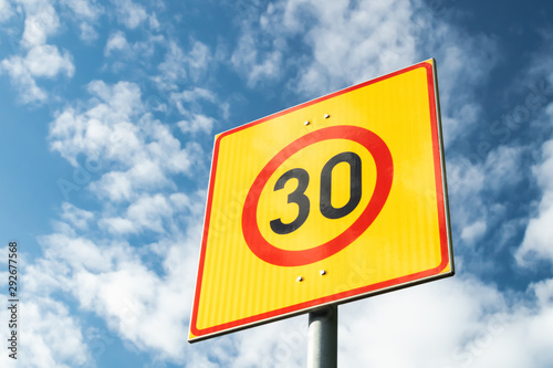 Finnish speed limit sign 30 km h on blue sky background