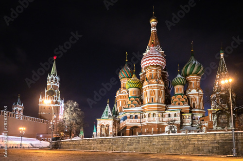 Evening Moscow. St. Basil's Cathedral with multi-colored domes. Cathedral on red square. Kremlin. View of the Russian capital in the evening. Black sky over Moscow. Symbol of Russia.