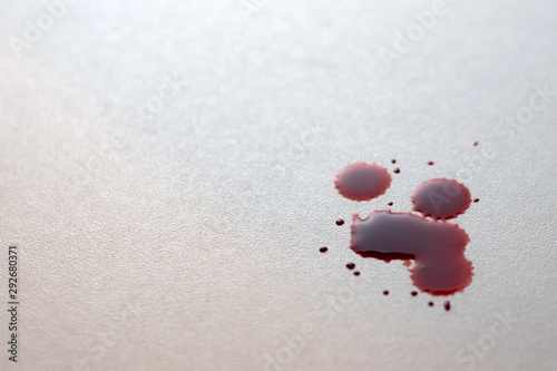 a few drops of blood on a white surface, short focus, toning