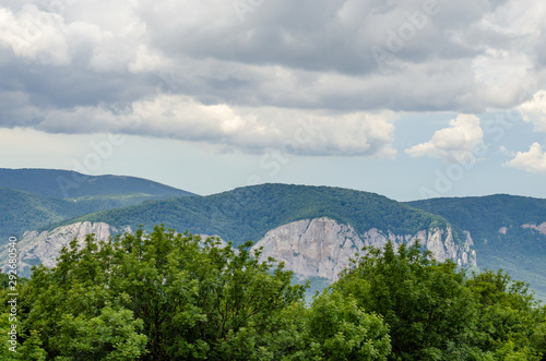 Mountains covered with forests before the rain.