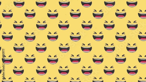 Wallpaper Mural A funny animation: a repeated pattern of laughing-out-loud (lol) faces, floating towards the upper left angle of the screen, over a yellow background.
 Torontodigital.ca