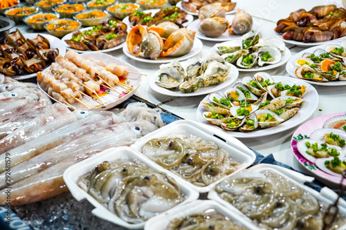 Street food in Phu Quoc island in Vietnam. Delicious seafood for tourist at market at night.