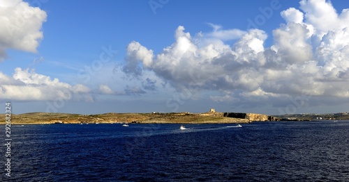 Pleasure craft sailing between Gozo and Comino photo