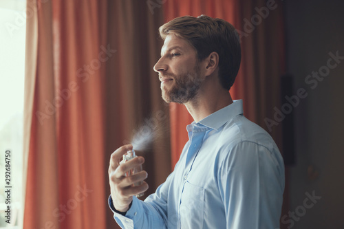 Serious young man preparing for his date © Yakobchuk Olena