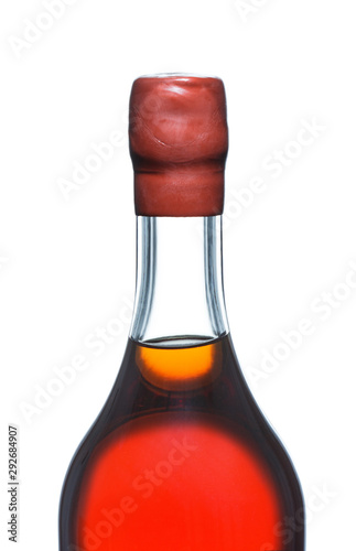 close-up bottle of strong alcohol, Armagnac, brandy, cognac isolated on a white background photo