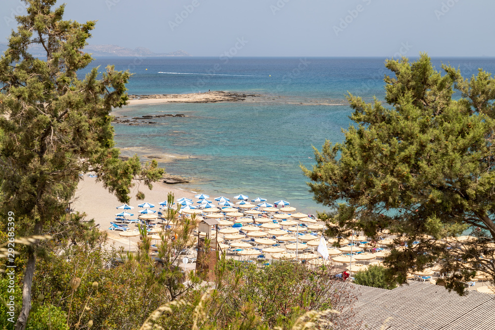 Scenic view at the coastline of Kiotari on Rhodes island, Greece with gravel beach