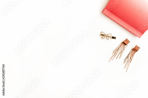 A pouch and woman accesories isolated on white background, Top view, copy space, Beauty concept