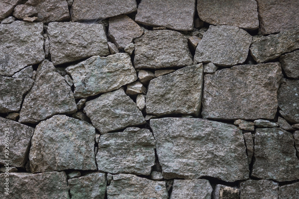 A wall made of stones.