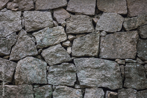 A wall made of stones.