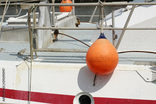 Closeup of boat with fenders © Jenny