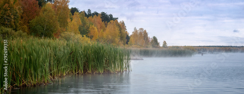 panorama of autumn landscape with forest lake, Russia, Ural