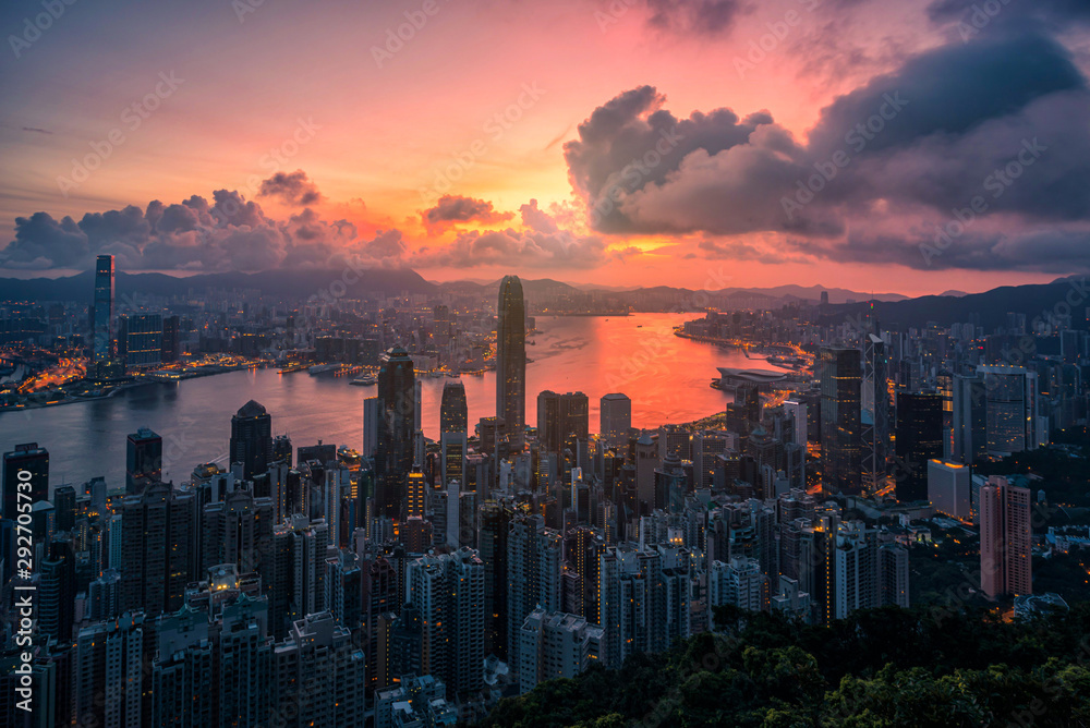 Hong Kong city at sunrise view from Peak mountain.