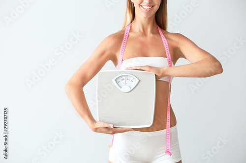 Beautiful young woman with ...