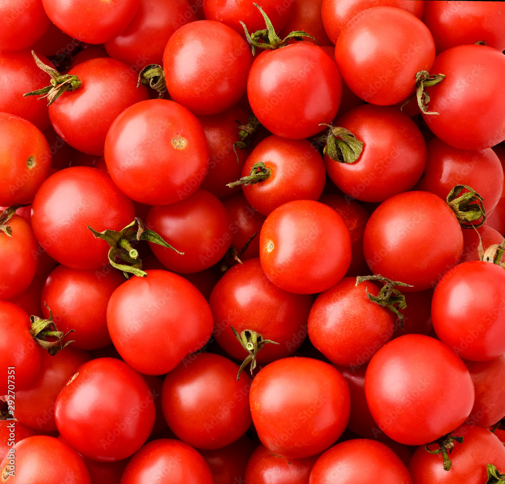 Ripe cherry tomatoes background. The view of the top. Ripe cherry tomatoes background. The view of the top.
