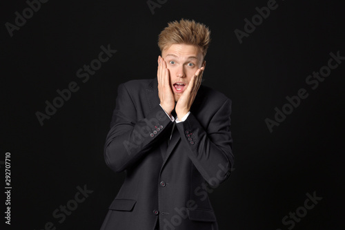 Shocked young businessman o...