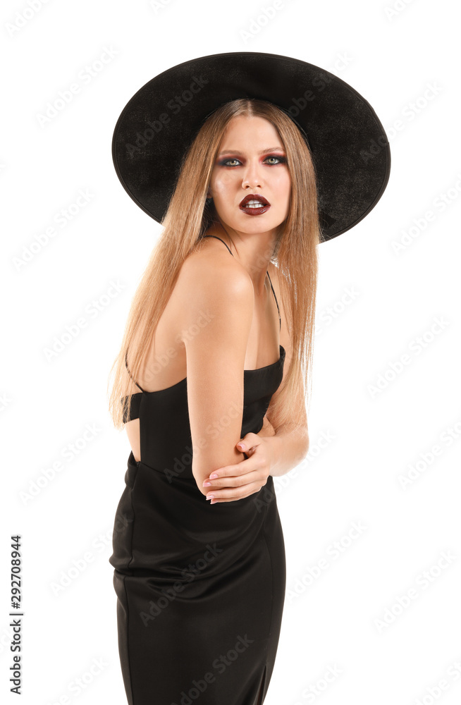 Beautiful woman dressed as witch for Halloween on white background Beautiful woman dressed as witch for Halloween on white background