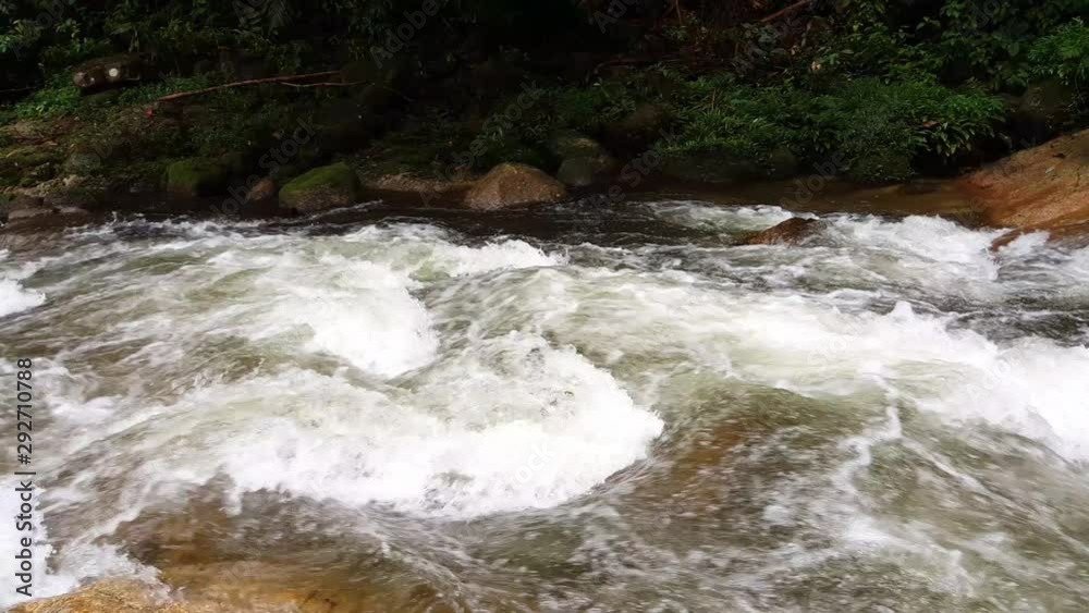 Fast water flow at the waterfall at Sungai Sedim, Kedah. Fast water flow at the waterfall at Sungai Sedim, Kedah.