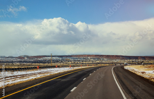 Highway in winter snow covers the desert of Tucson, Arizona