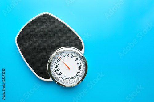 Floor scales on color background