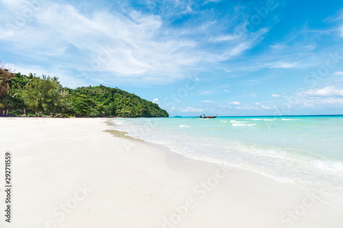 Empty sunny Phi Phi island Loh Moo Dee Beach with white sand and clear sea