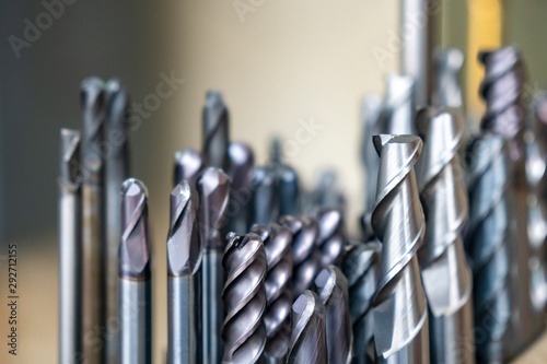 The various type  cutting tools of CNC machine on the stock shelf  in the store room. The set of CNC cutting tool , solid ball ,bull or radius ,flat or square, tapping endmill tools.