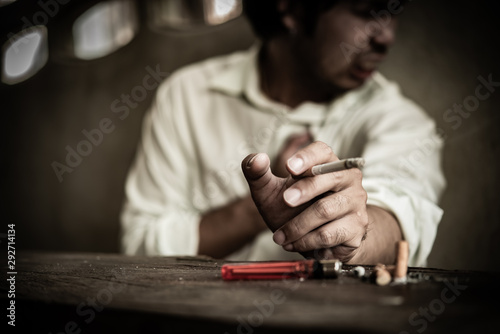 Asian Stress man smoking Thailand people No tobacco day concept DIe from smoke smoking cigarette