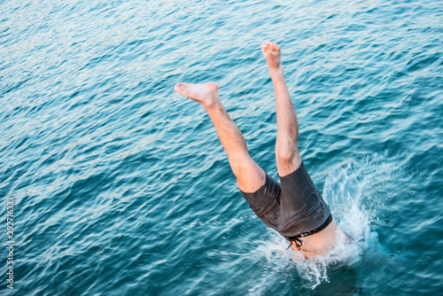 guy dives into the water