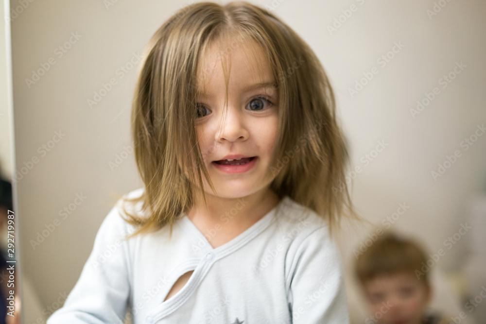 Little girl in pajamas before going to bed Little girl in pajamas before going to bed