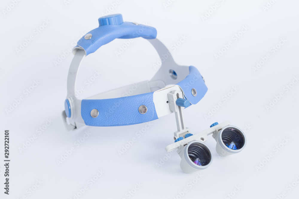 Medical dental binocular lenses on a white background. Medical dental binocular lenses on a white background.