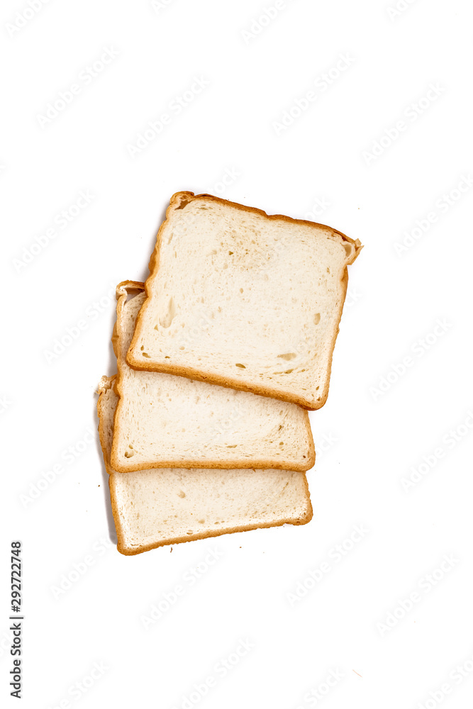 Slices of wheat bread for toast on white isolated background