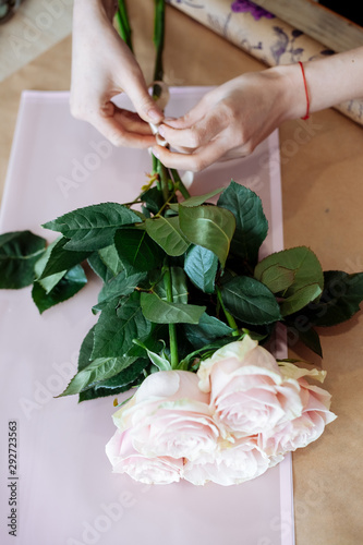 Pink roses on craft paper.