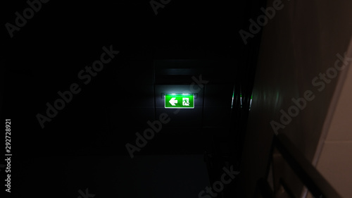 Emergency exit sign Shining light in the dark