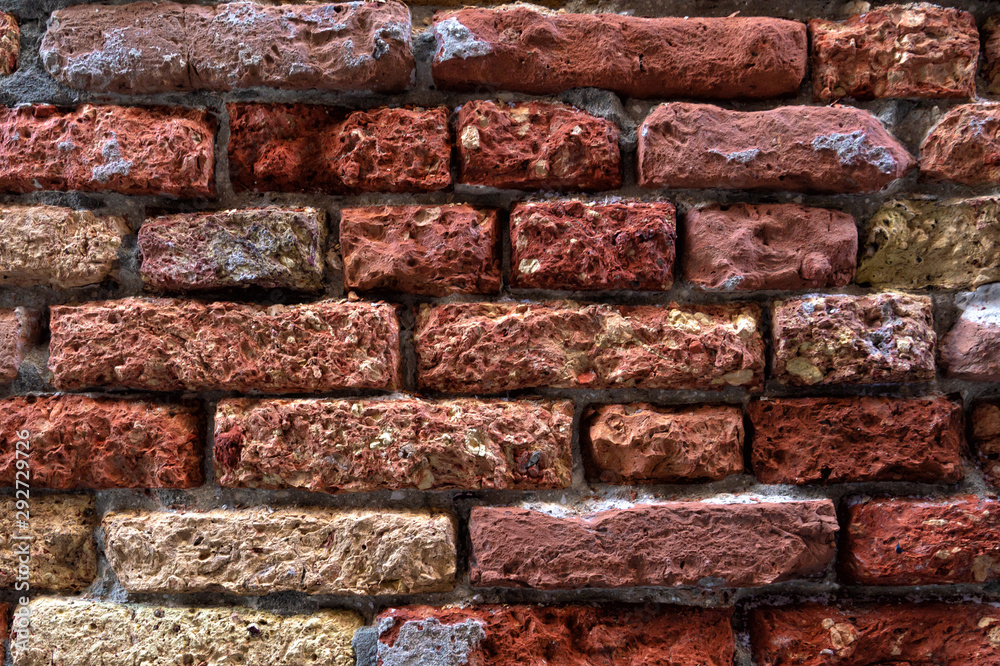 Old masonry of red and yellow bricks Old masonry of red and yellow bricks