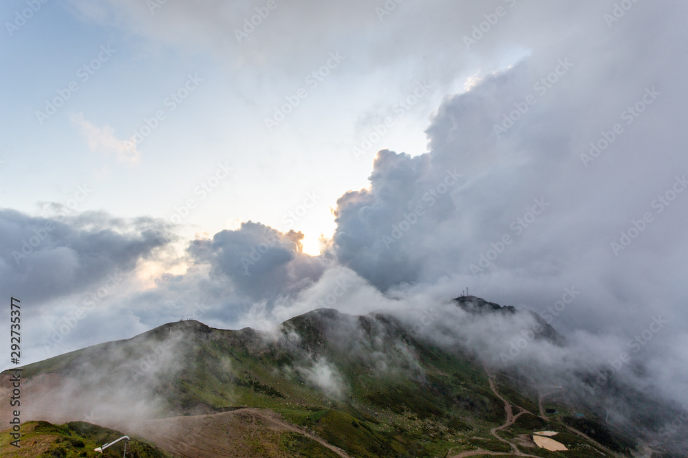 Background photo of low clouds in a mountain valley