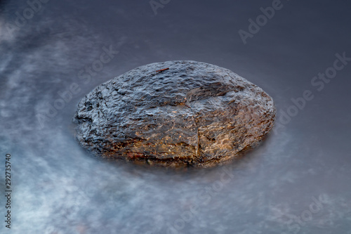 Rock in the waters edge © Steven Hedley