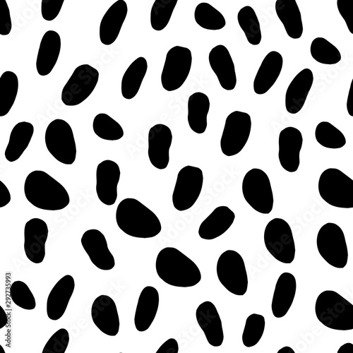 Abstract seamless pattern with black spots on white. Dalmatian skin imitation. Animal print. Vector illustration for textile, fabric, wrapping paper, web background.