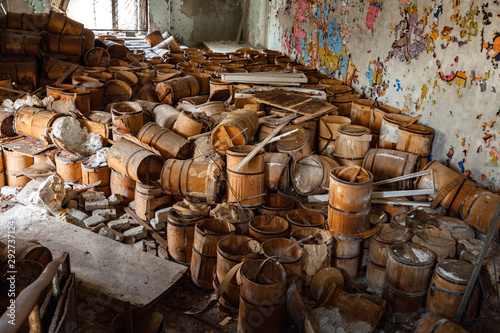 Tela Old and damaged wine and beer barrels