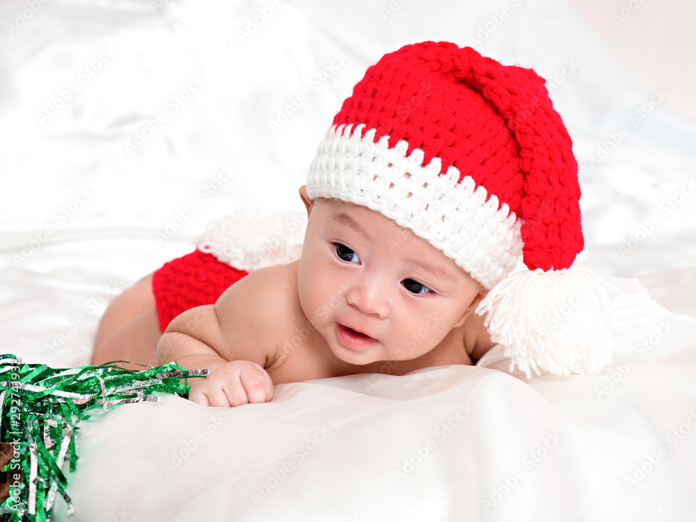 cute newborn three-month baby in lovely action cute newborn three-month baby in lovely action