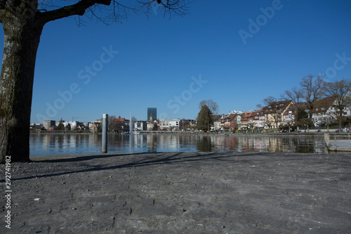 piecefull day on the pier on lake zug, switzerland photo