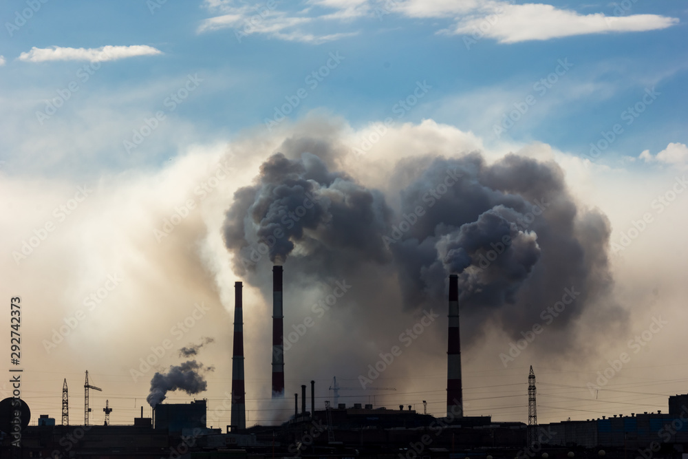 The smoke of the Norilsk combine. The sky in the smoke from the chimneys of Norilsk Nickel plant.