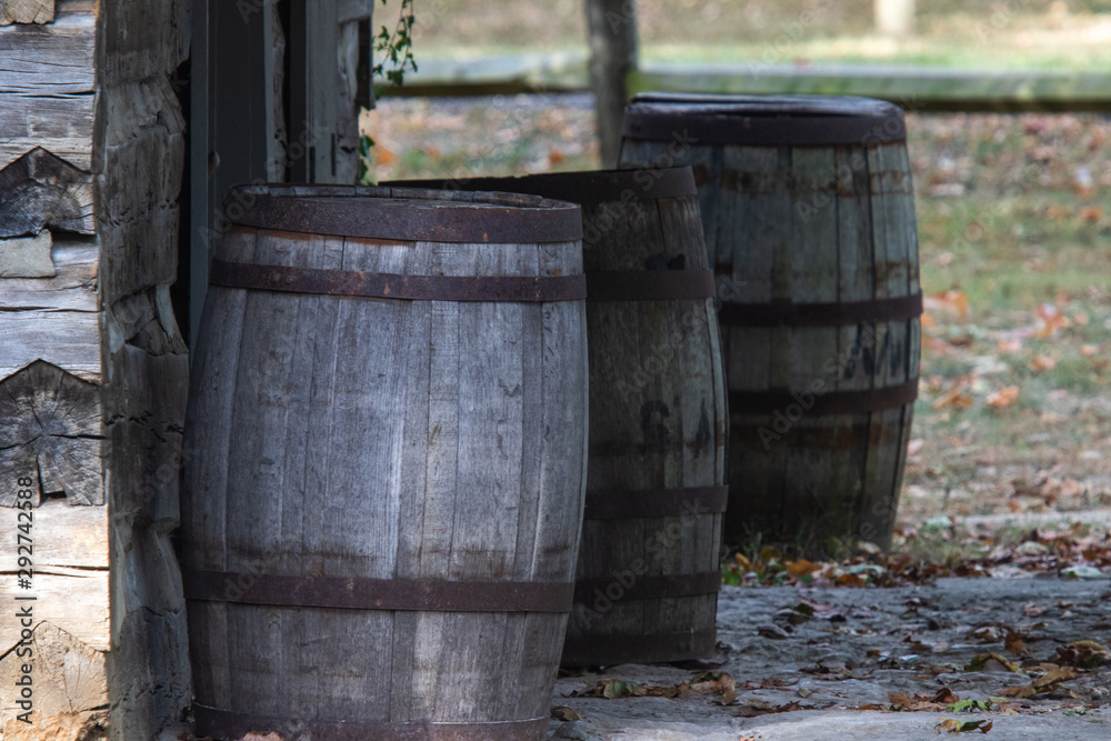 wooden rain barrels in gravel wooden rain barrels in gravel