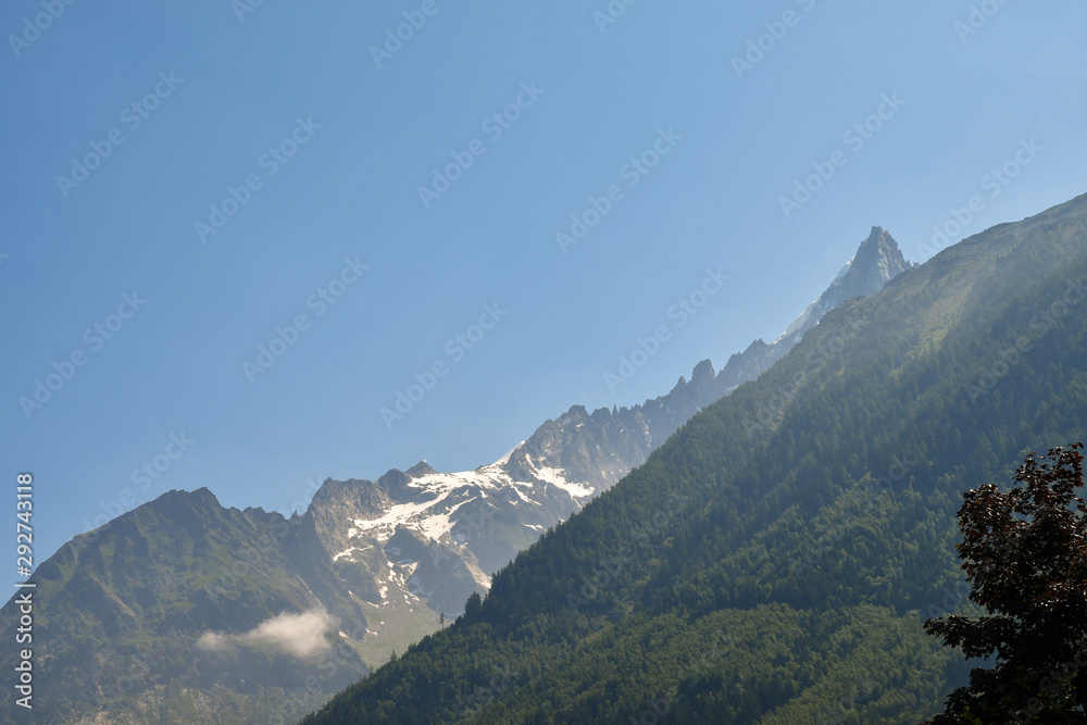 Mountain landscape with the snowcapped Aiguilles du Dru in summer, Chamonix-Mont-Blanc, Haute Savoie, France 
